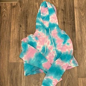 Cropped tie dye pink, blue, and white sweatshirt.